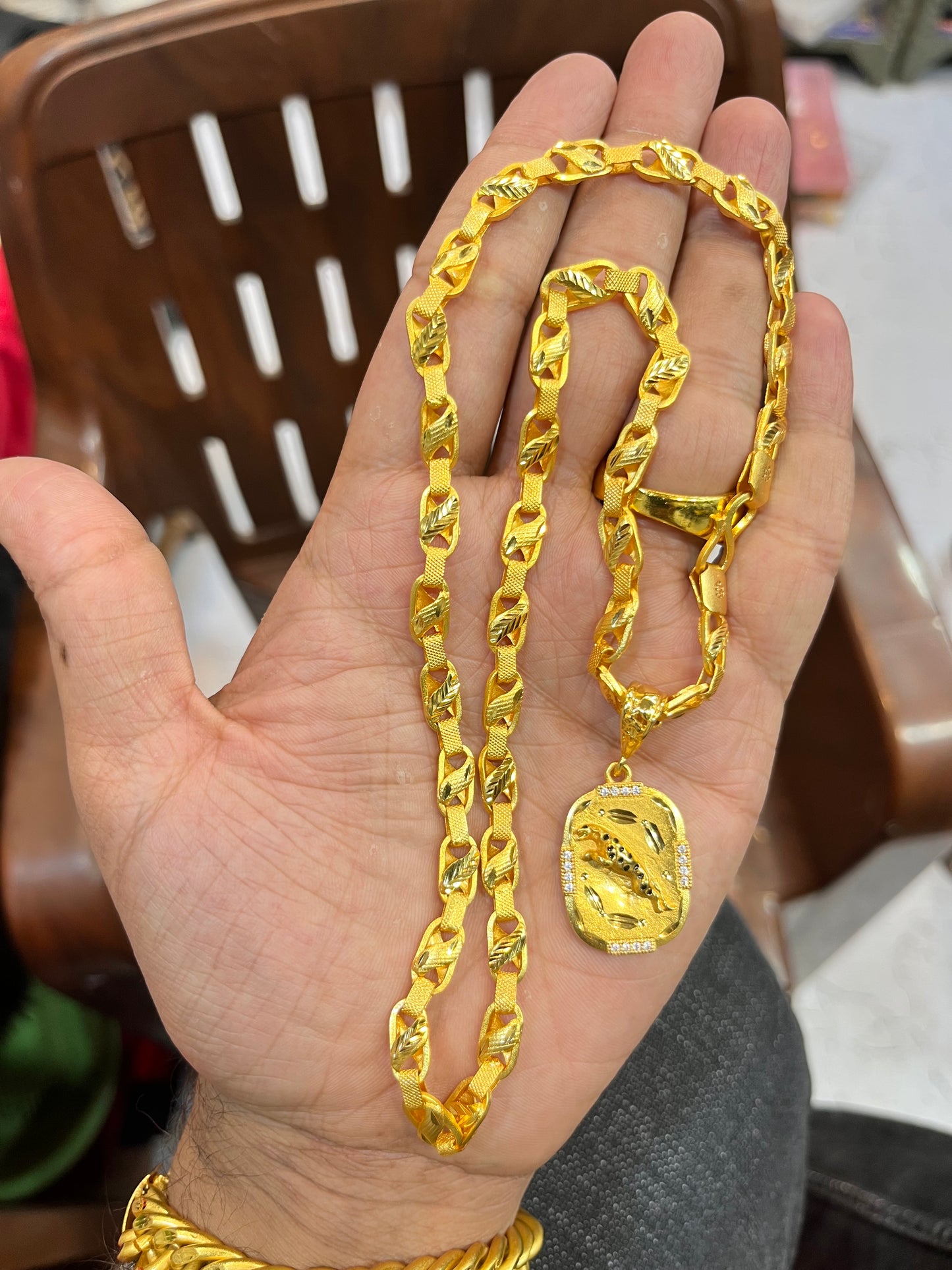 one gram gold plated slim chain with jeguar pandent