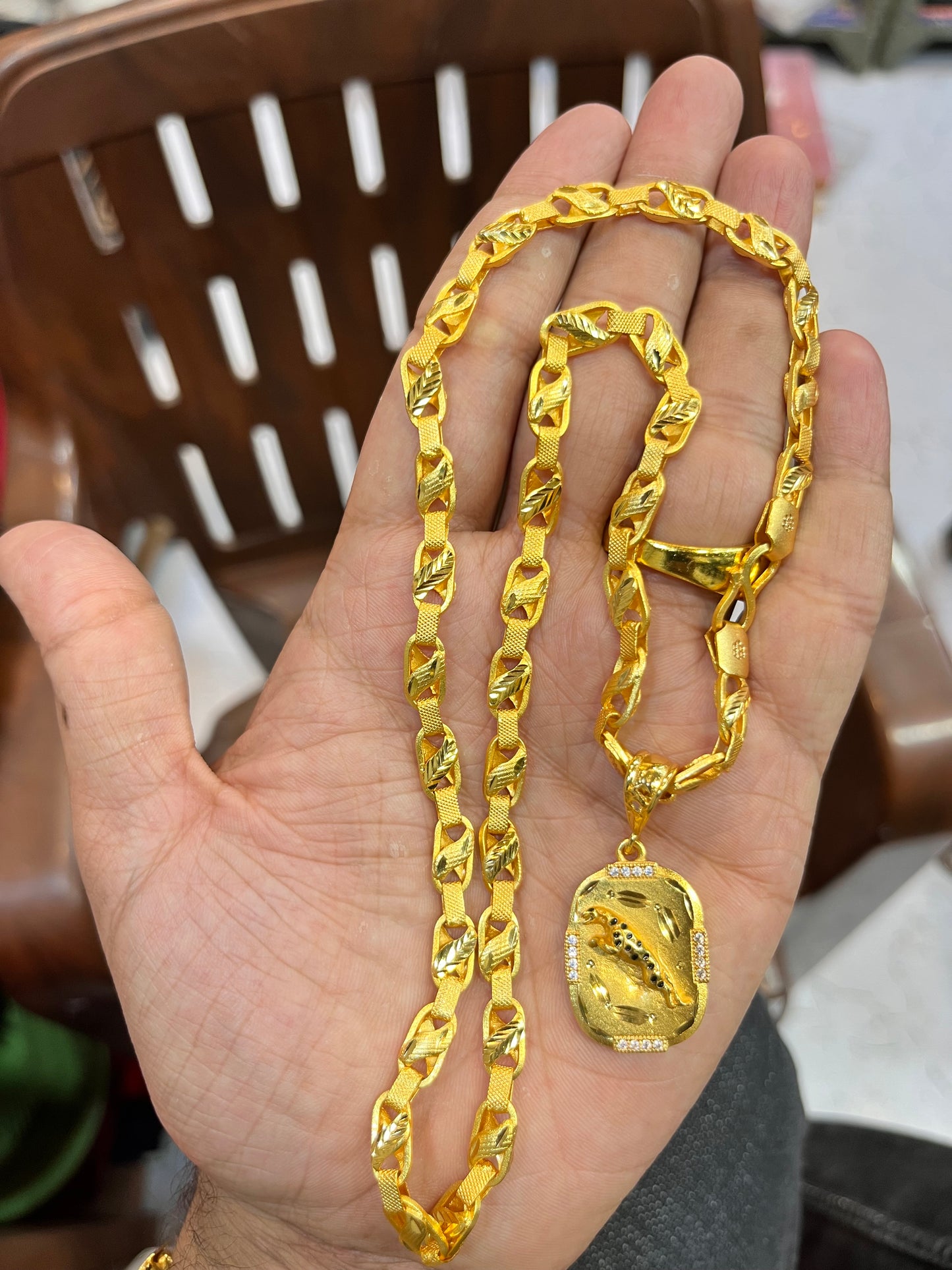 one gram gold plated slim chain with jeguar pandent