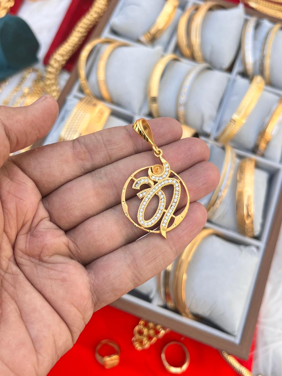 Gold plated om daimond premium pandent